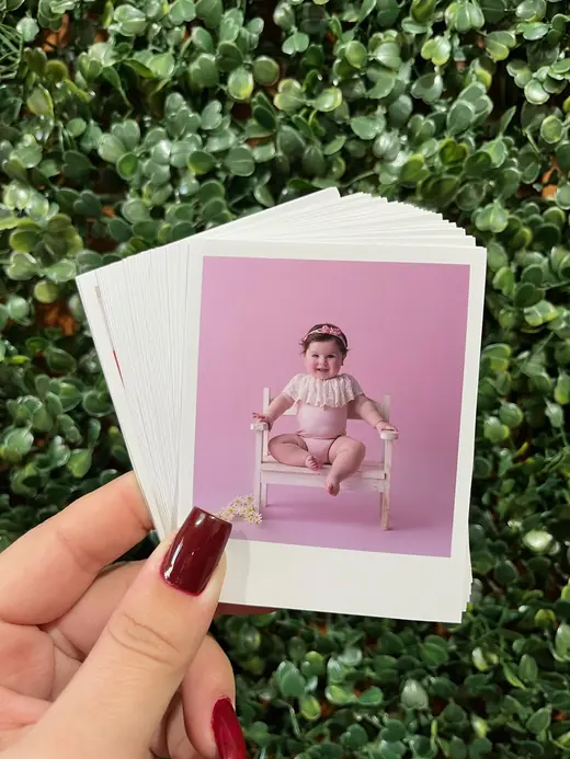 Polaroids com foto de ensaio de bebê